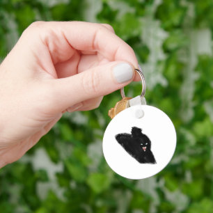Porte-clés Chat noir sifflant montrant les crocs dessin au cr