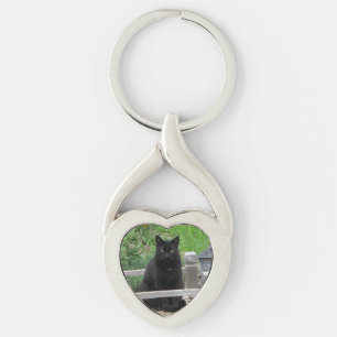 Porte-clés Chat noir sur le porte - clé de coeur de pont