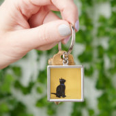 Porte-clés Chaton noir dans le collier (main)