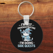 Porte-clés Chats de joueurs Quête secondaire Procrastinant Ta (Recto)