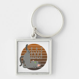 Porte-clés Chatte drôle faisant du yoga.