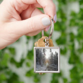 Porte-clés Chemin de terre de Milou entrant dans le soleil (main)