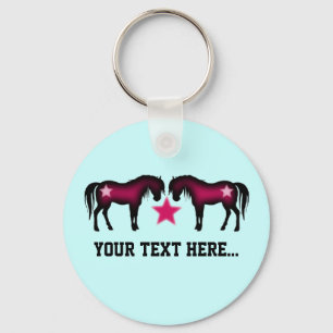 Porte-clés Chevaux roses mignons sur le bleu