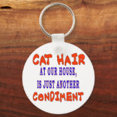 PORTE-CLÉS CHEVEUX CHAUSSÉS À NOTRE MAISON (Recto)
