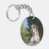 Porte-clés Chien de boxeur s'étendant sur une roche (Devant gauche)