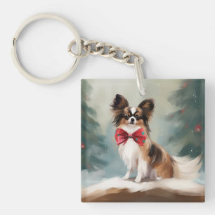 Porte-clés Chien de Papillon à Noël de neige
