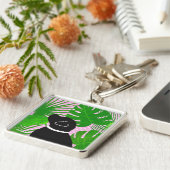 Porte-clés chien noir d'île tropicale verte (Côté)