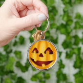 Porte-clés Citrouille sculpté souriant design Halloween (Main)