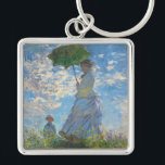 Porte-clés Claude Monet - La Promenade, Femme avec un Parasol<br><div class="desc">La Promenade,  Femme avec un Parasol / Madame Monet et son fils / La Promenade / La Femme a l'ombrelle - Claude Monet,  1875</div>