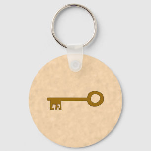 Porte-clés Clé. Clé marron sur fond d'effet parchemin.