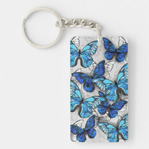 Porte-clés Composition de papillons blancs et bleus