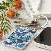Porte-clés Composition de papillons blancs et bleus (Devant droit)