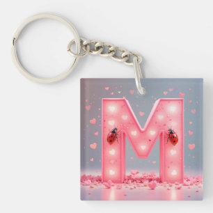 Porte-clés Conception de lettre M rose vif