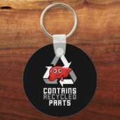 Porte-clés Contient des pièces recyclées Survivant d'une gref (Recto)