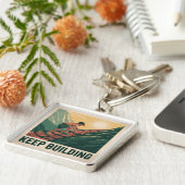 Porte-clés Continuer à construire (Côté)