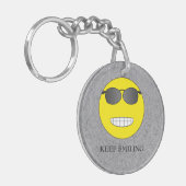 Porte-clés Continuez à sourire (Devant gauche)