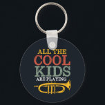Porte-clés Cool Enfants Jouer Trumpet Funny Marching Band<br><div class="desc">Conception amusante de trompette pour ceux qui jouent de l'instrument de musique en laiton dans un groupe de musique, orchestre ou performance musicale. Cool vintage retro Merchandises pour amoureux de musique jazz pour musicien et membre du groupe de marche. Parfait pour les professeurs de musique, les fans d'orchestre et ceux...</div>