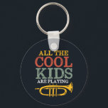 Porte-clés Cool Enfants Jouer Trumpet Funny Marching Band<br><div class="desc">Conception amusante de trompette pour ceux qui jouent de l'instrument de musique en laiton dans un groupe de musique, orchestre ou performance musicale. Cool vintage retro Merchandises pour amoureux de musique jazz pour musicien et membre du groupe de marche. Parfait pour les professeurs de musique, les fans d'orchestre et ceux...</div>