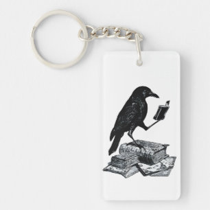 Porte-clés Corbeau magique avec des livres académiques