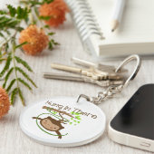 Porte-clés Coup de singe dedans là (Devant Droit)