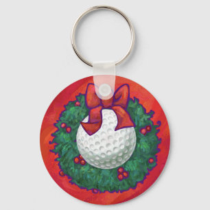 Porte-clés Couronne de Noël aux balles de golf sur fond rouge