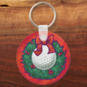 Porte-clés Couronne de Noël aux balles de golf sur fond rouge (Recto)