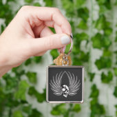 Porte-clés Crâne croisé avec ailes (main)