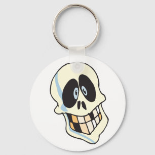 Porte-clés crâne de squelette souriant drôle