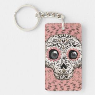 Porte-clés Crâne en sucre rose et or et cœurs fantaisistes mi