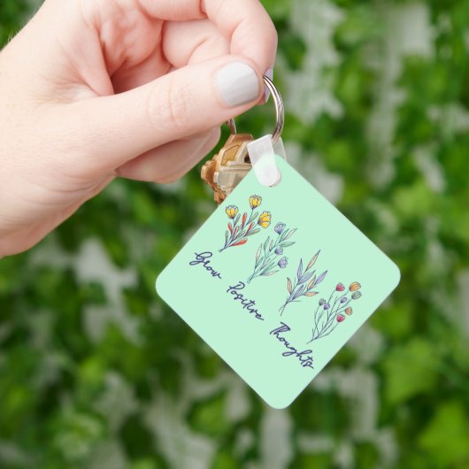 Porte-clés Croissance des pensées positives Fleur sauvage Flo (main)