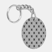 Porte-clés Croix noire coutures sur gris (Devant gauche)