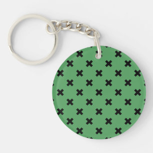 Porte-clés Croix noire sur le vert