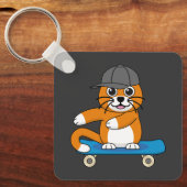 Porte-clés Cute Orange Chat sur Skateboard Cartoon (Recto)