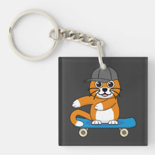 Porte-clés Cute Orange Chat sur Skateboard Cartoon