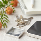 Porte-clés Cyclone tropical Aila (Côté)