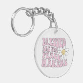 Porte-clés Daisy et les artisans de la paix Slogan (Devant gauche)