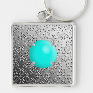 Porte-clés Damas d'argent avec une fausse pierre turquoise