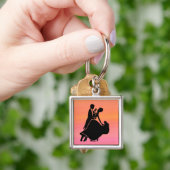 Porte-clés danceurs de soleil couchant tropical (main)