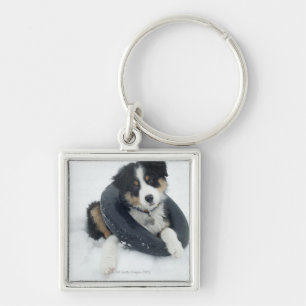 Porte-clés dans la chambre à air dans la neige