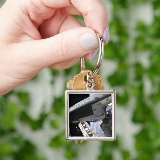 Porte-clés Découverte de navette spatiale ancrée (main)