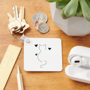 Porte-clés Dessin au trait de chat mignon, avec trois cœurs