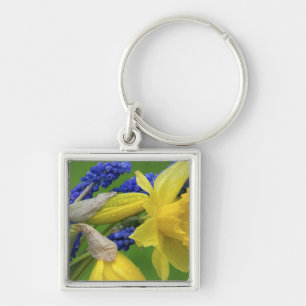 Porte-clés Détail des fleurs de jonquille et de jacinthe. Cré