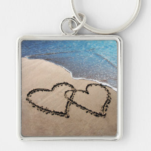 Porte-clés Deux coeurs dans le porte - clé d'amour de sable