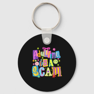 Porte-clés Devenir adulte est une arnaque style mixte média,