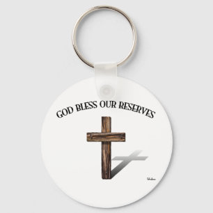 Porte-clés DIEU BÉNISSE NOS RÉSERVES avec une croix robuste