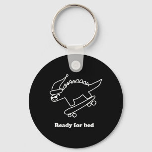 Porte-clés Dinosaure de skateboard prêt pour le lit