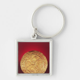 Porte-clés Disque probablement utilisé comme broche, de
