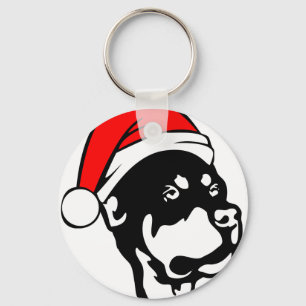 Porte-clés Doigt Rottweiler portant le chapeau de Noël rouge