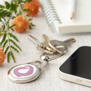 Porte-clés Dragon cardiaque mauve sur blanc