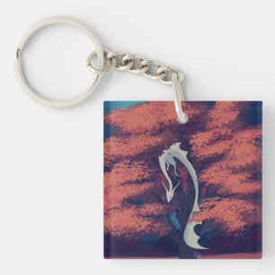 Porte-clés dragon transparent dans l'arbre